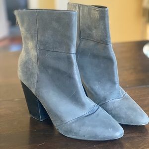 Kelsi Dagger black heeled boots.